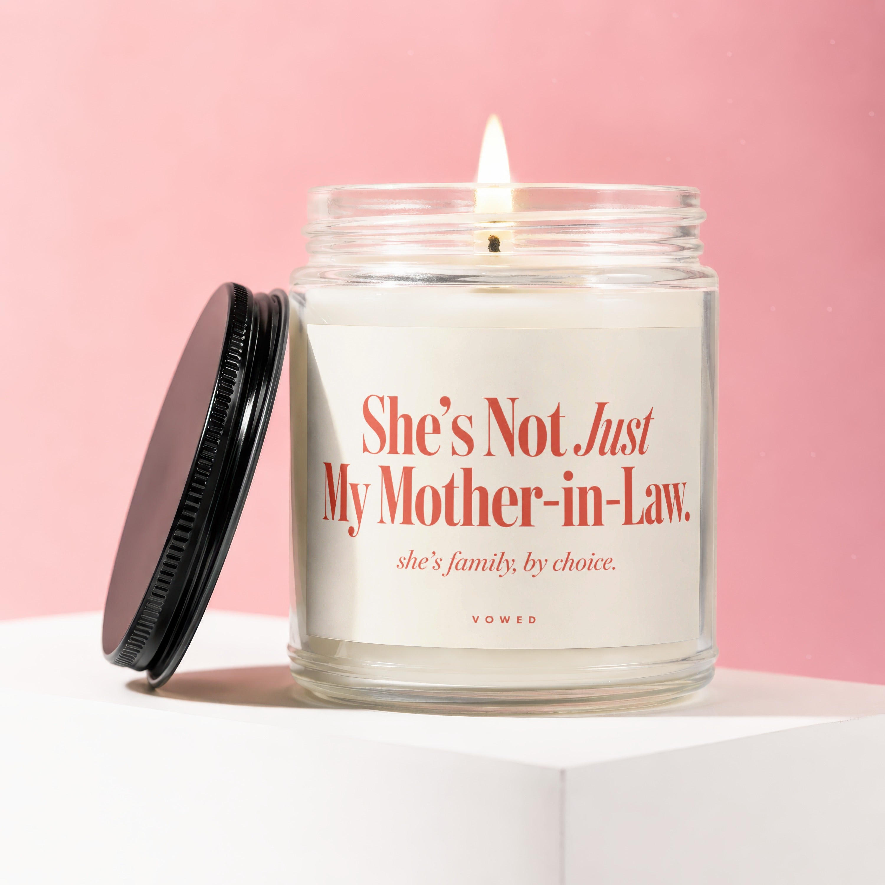 Candle with text "She's Not Just My Mother-in-Law. she's family, by choice. VOWED"