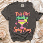 Gray t-shirt with neon graphic text "This Girl Needs a Spicy Marg".