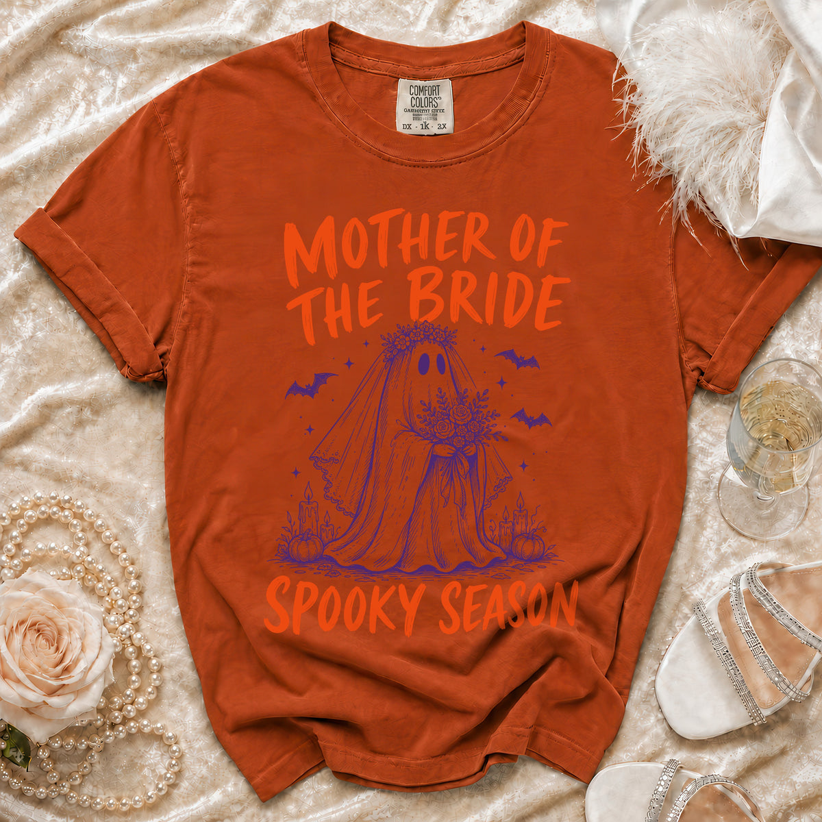 Orange t-shirt with "Mother of the Bride Spooky Season" text and ghost bride graphic.