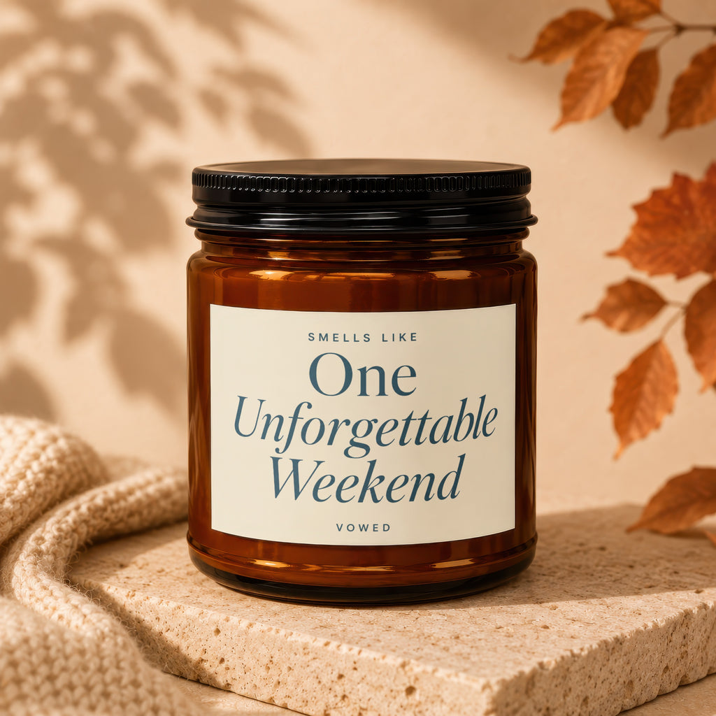 Amber jar candle with label reading "Smells Like One Unforgettable Weekend"