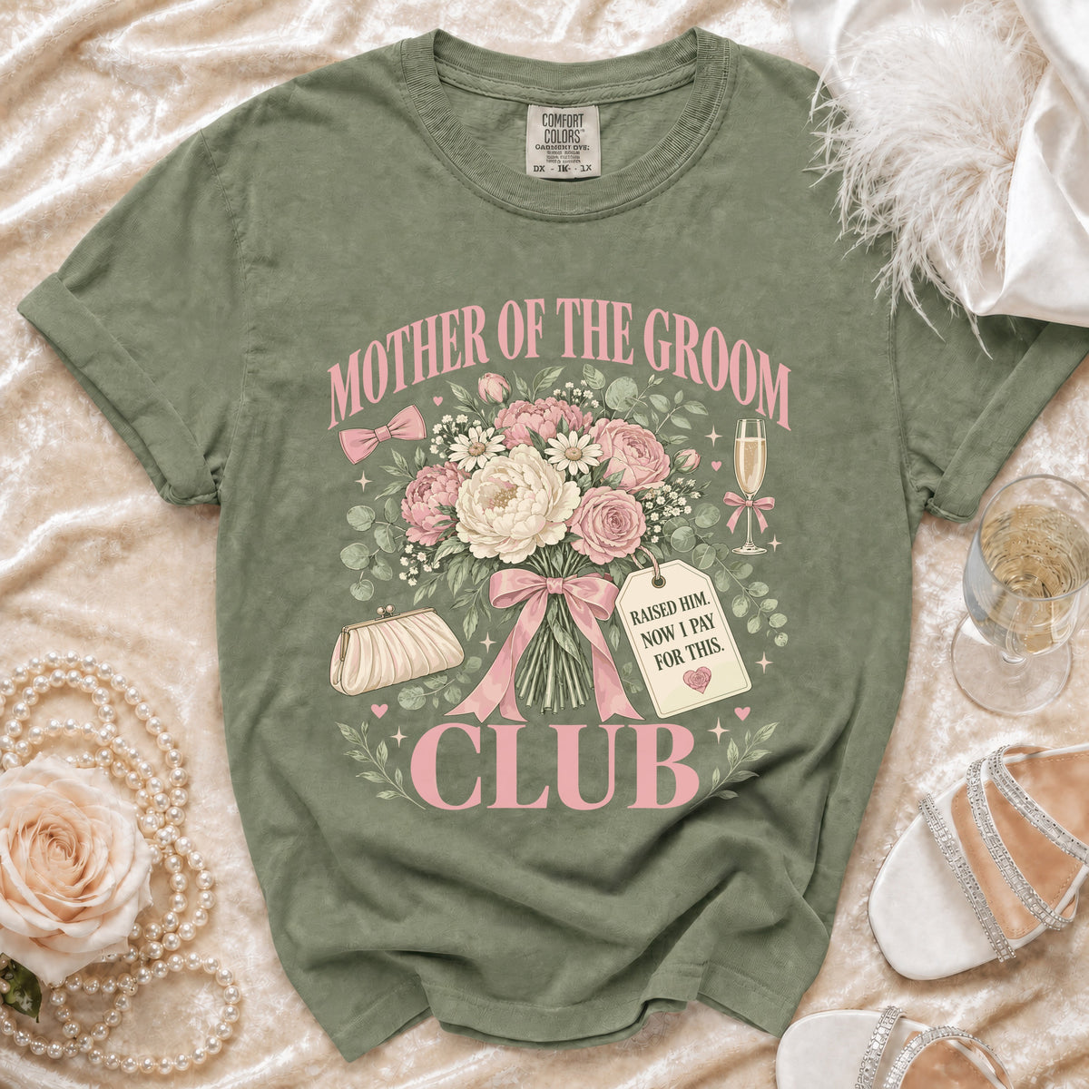 Olive green t-shirt with "Mother of the Groom Club" text and floral design.