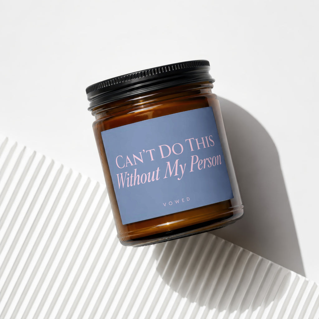 Brown glass candle with purple label that reads "CAN'T DO THIS Without My Person," VOWED.