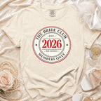 Cream t-shirt with "The Bride Club Est. 2026 Members Only" logo.