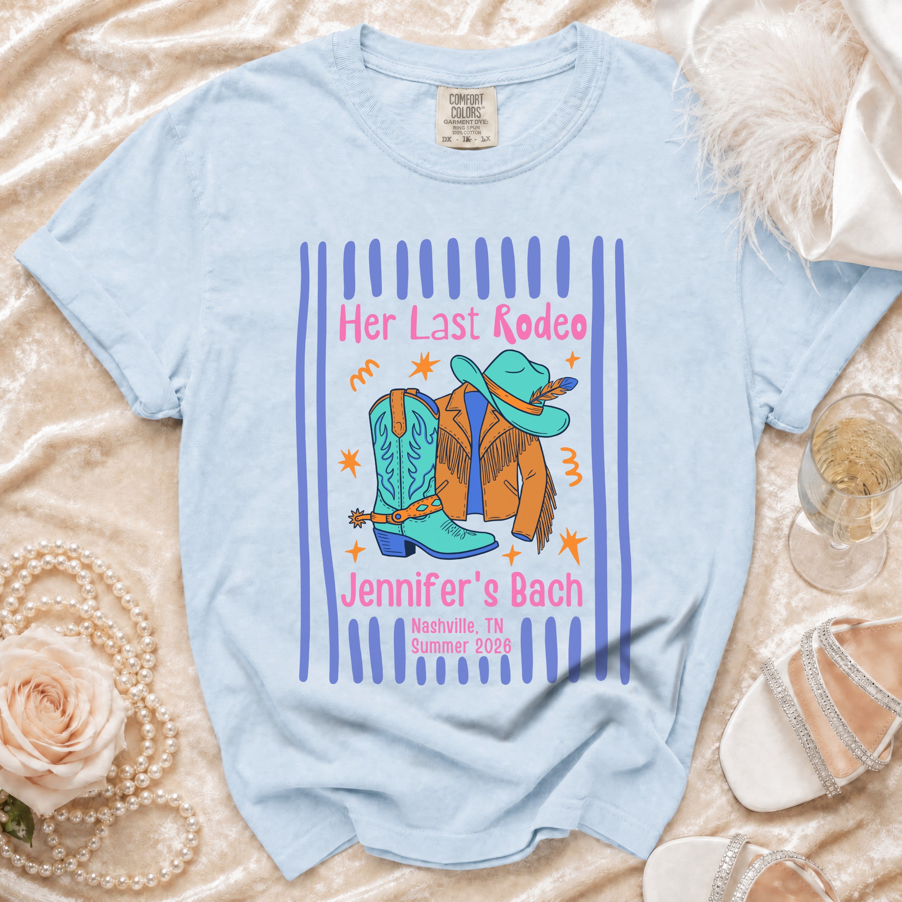 Light blue t-shirt with "Her Last Rodeo Jennifer's Bach" and cowboy boot graphic.