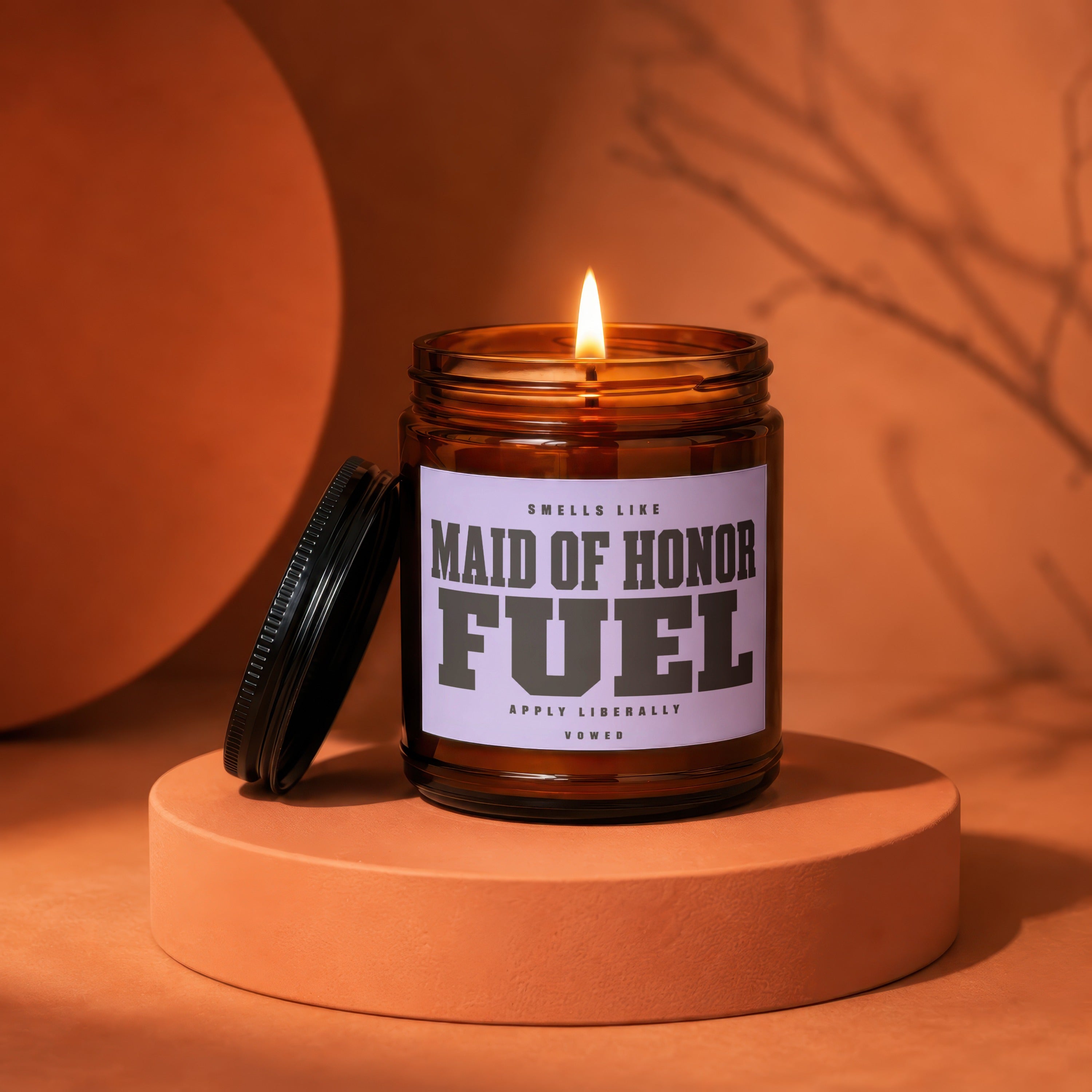 Candle with lit flame labeled "Maid of Honor Fuel" on an orange platform.