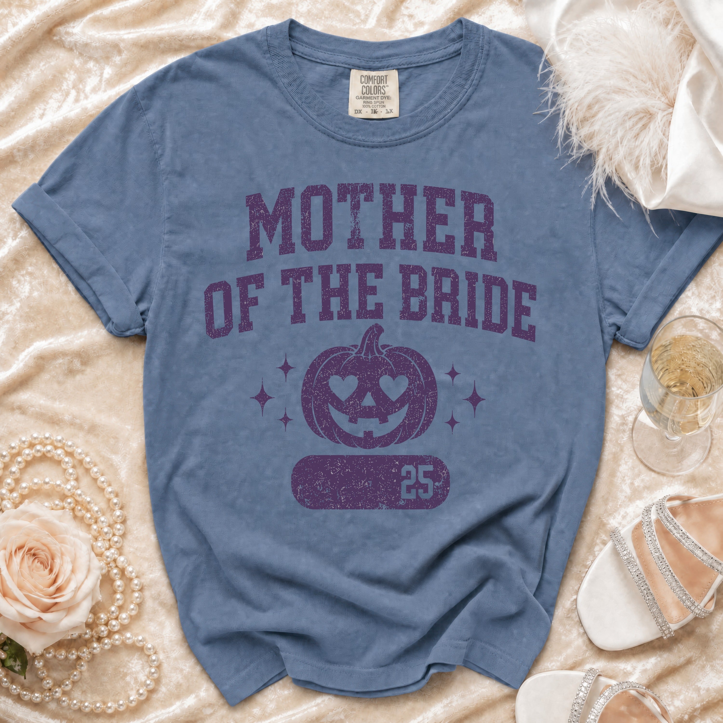 Blue t-shirt with "Mother of the Bride" and a pumpkin graphic.