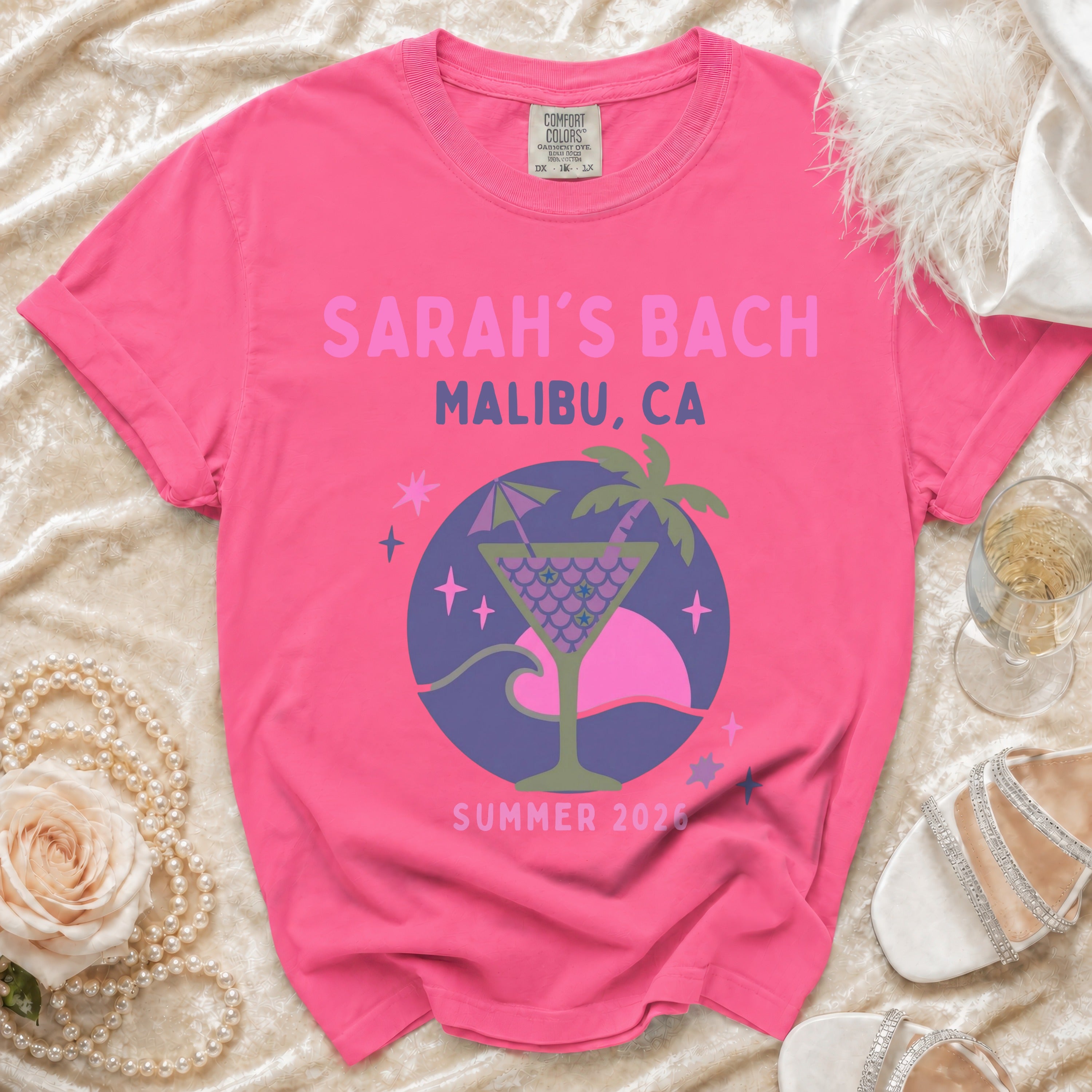 Sarah's Bach Malibu, CA Summer 2026 t-shirt with a tropical drink graphic.