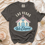 Dark grey t-shirt with "LAS VEGAS We Eloped" and wedding chapel graphic.
