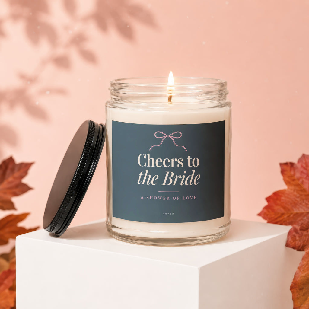 Candle with a lid, labeled "Cheers to the Bride, A Shower of Love".