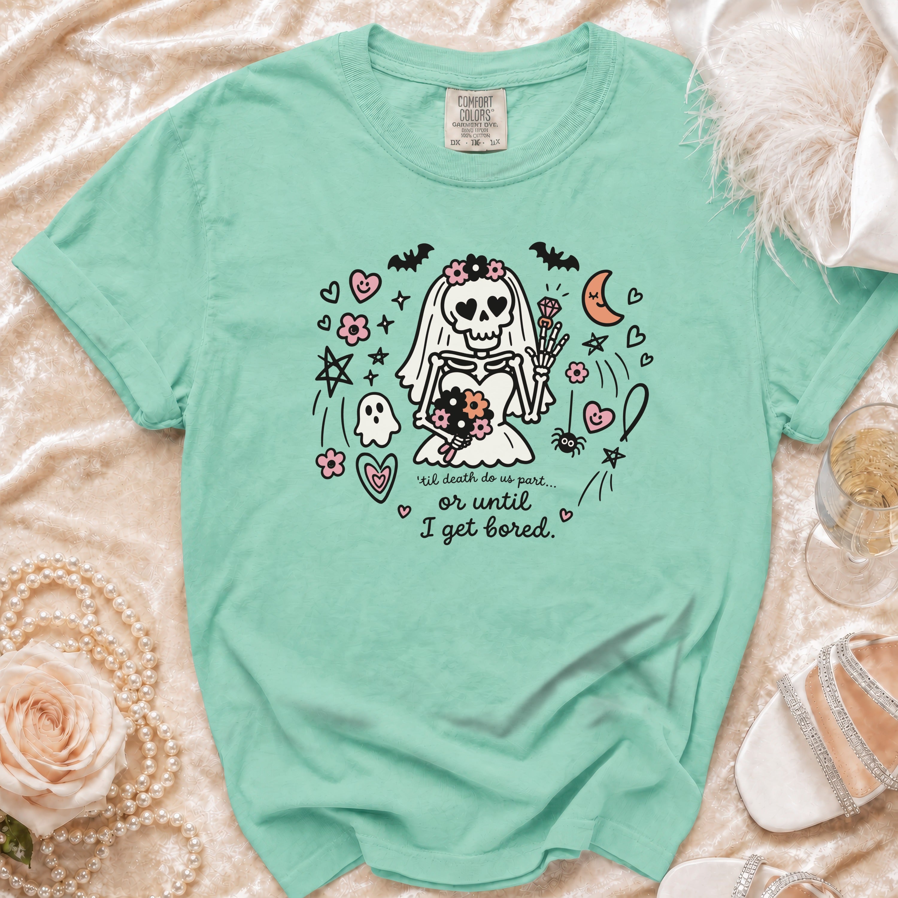 Mint t-shirt with skeleton bride graphic and text "'til death do us part... or until I get bored."