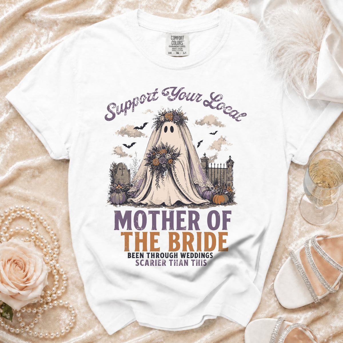 White t-shirt with "Mother of the Bride" graphic featuring a ghost bride and spooky cemetery scene.
