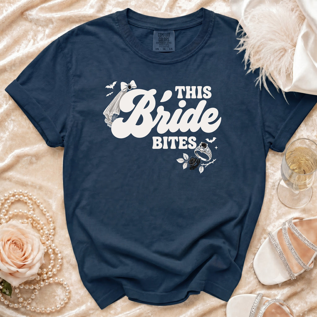 Dark navy t-shirt with "This Bride Bites" text and gothic bride graphics.
