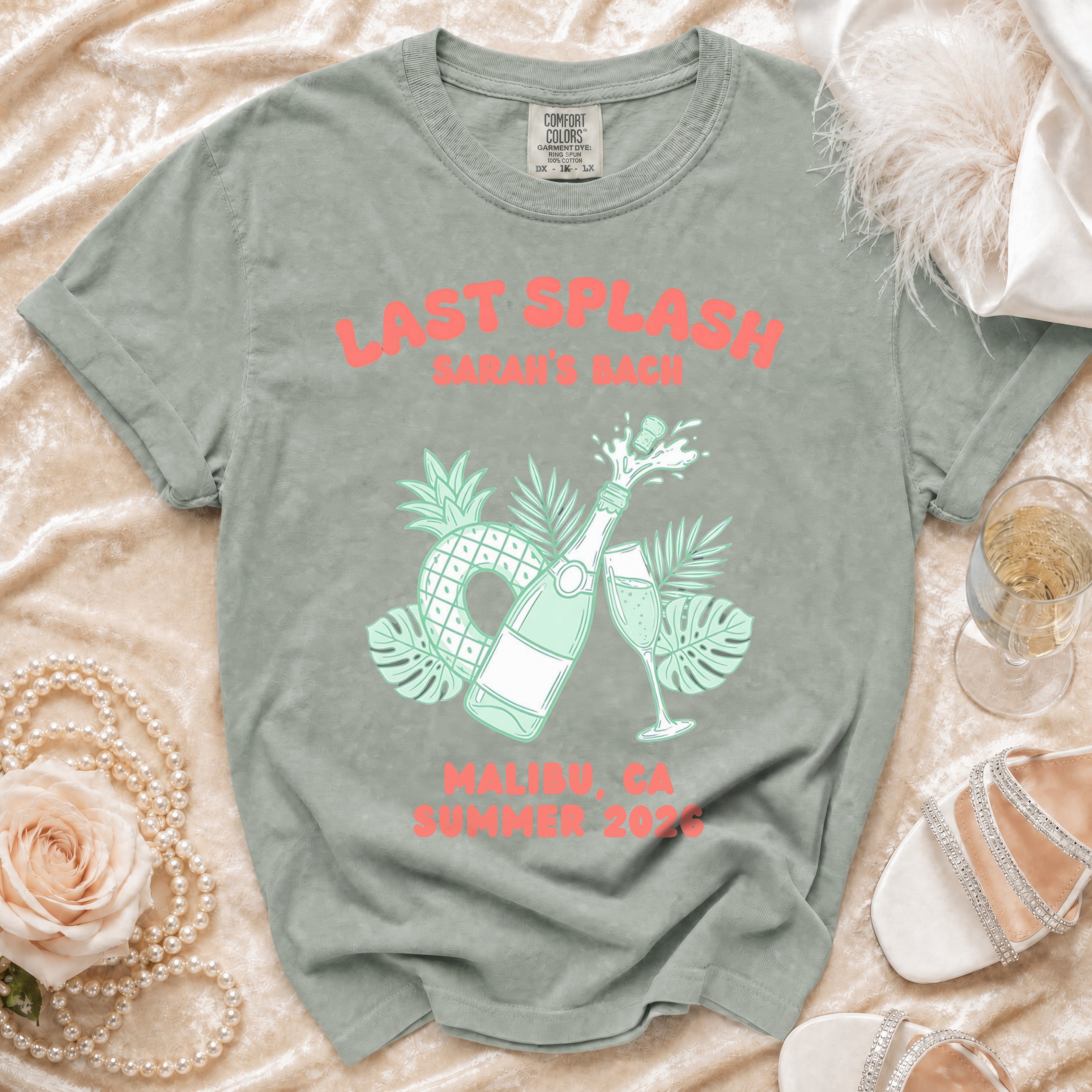 T-shirt with "Last Splash Sarah's Back Malibu CA Summer 2023" text and tropical graphics.