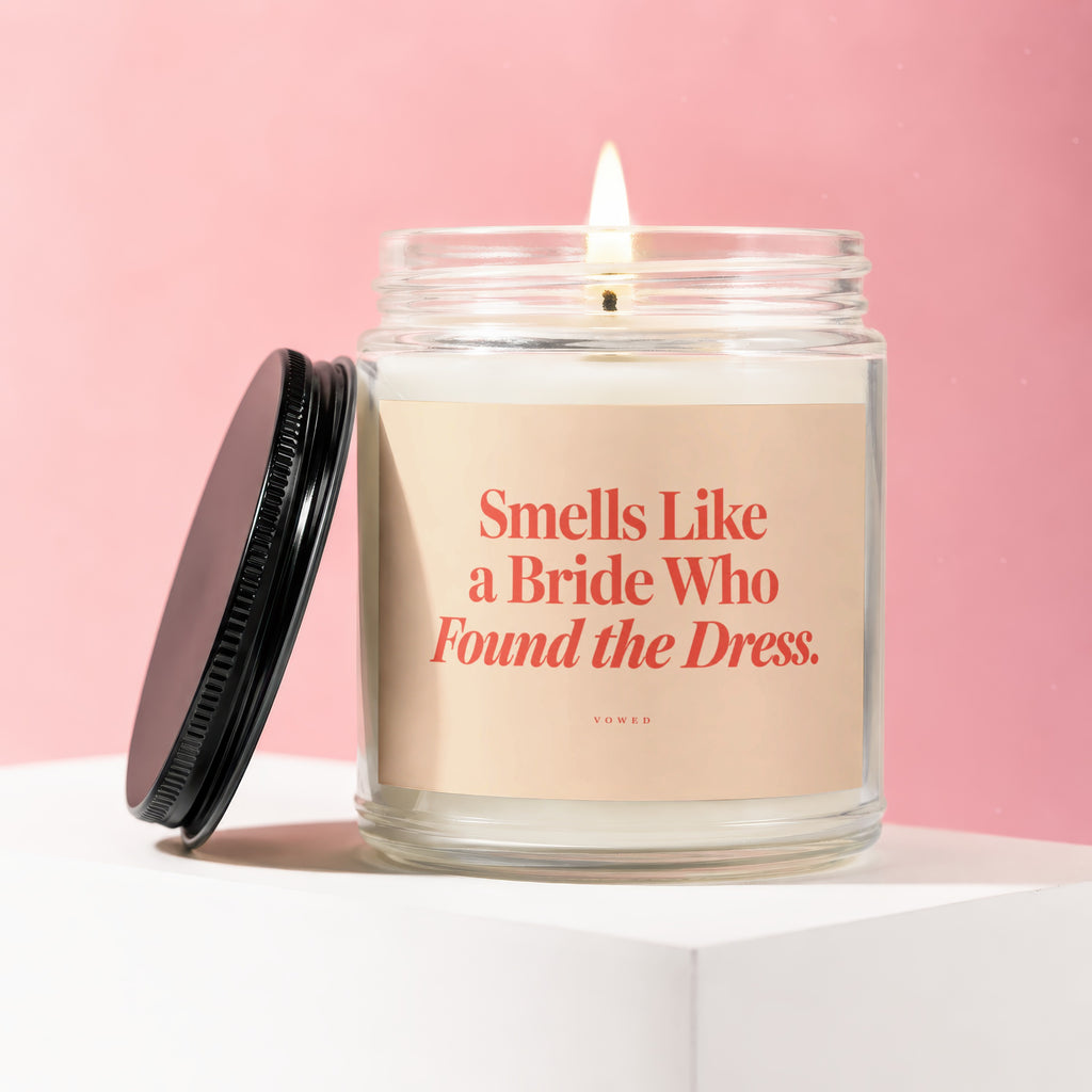 Candle with text "Smells Like a Bride Who Found the Dress."