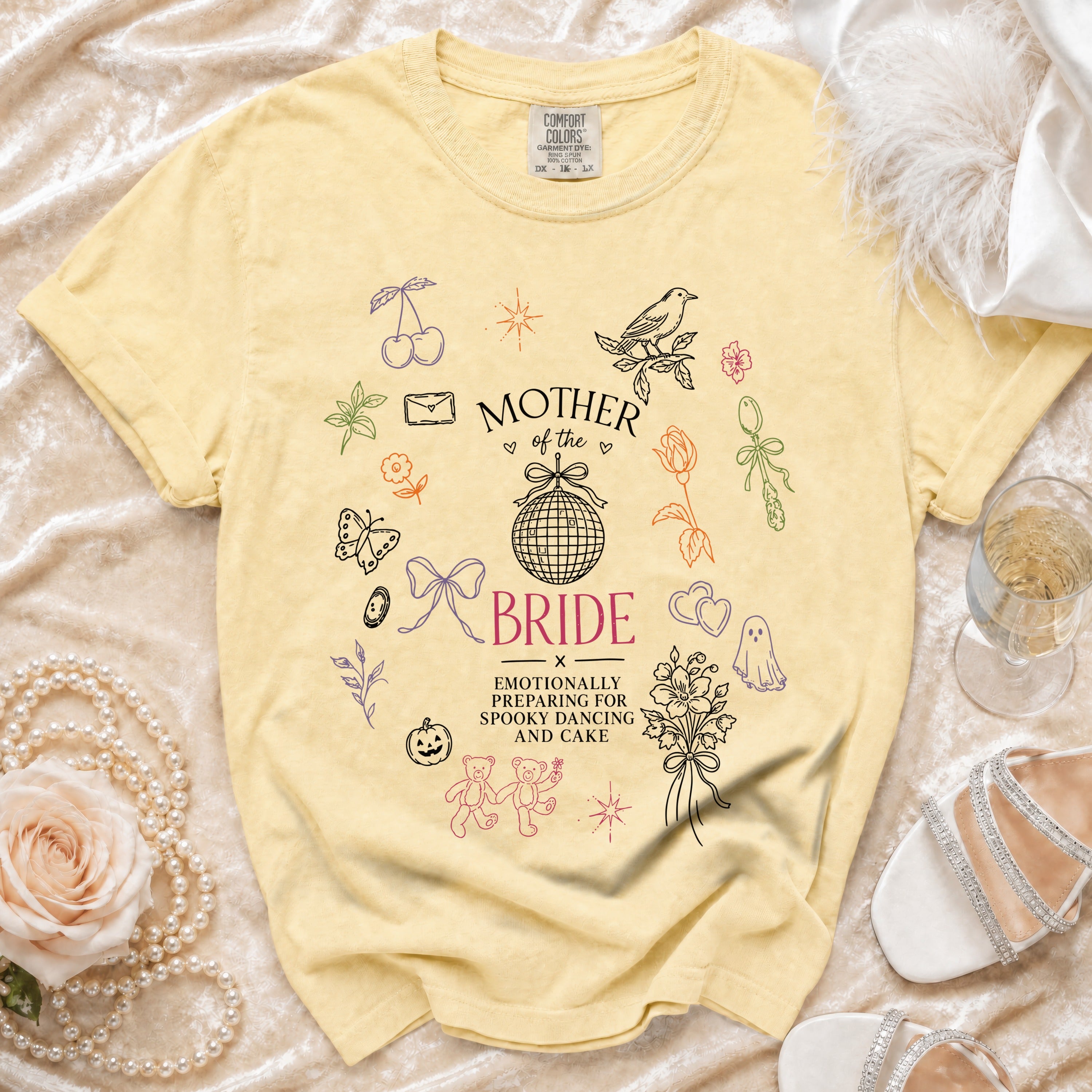 Yellow t-shirt with "Mother of the Bride" and spooky dancing text.