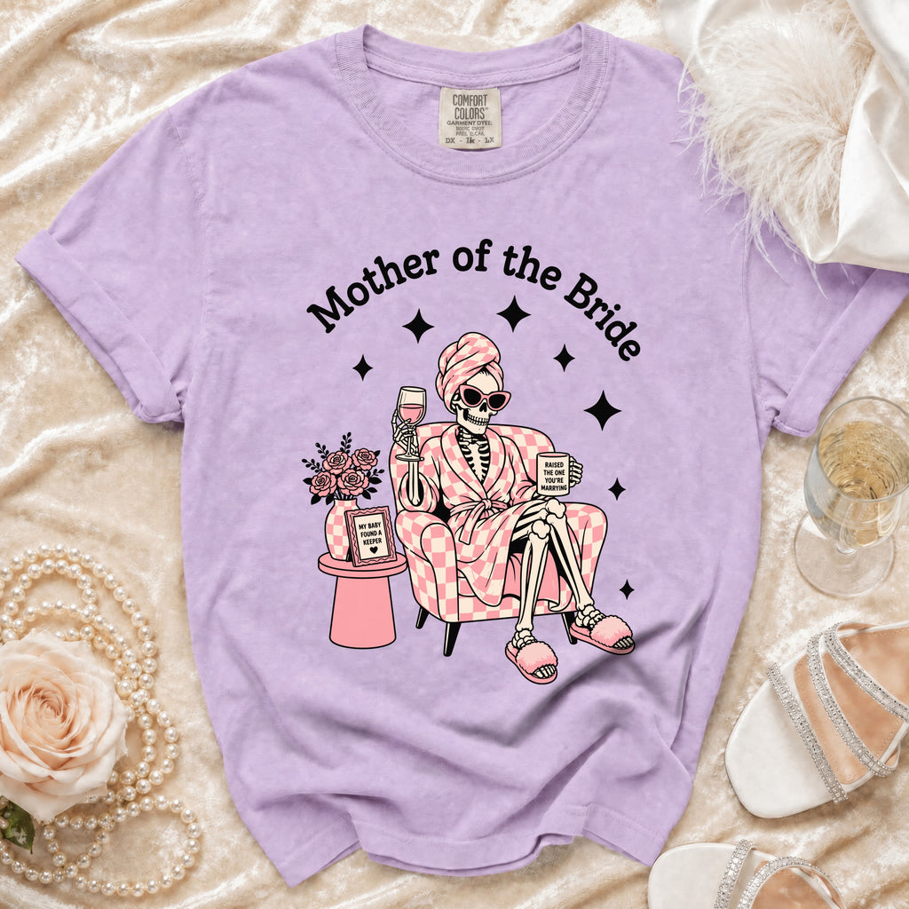 Purple t-shirt with "Mother of the Bride" text and skeleton graphic.