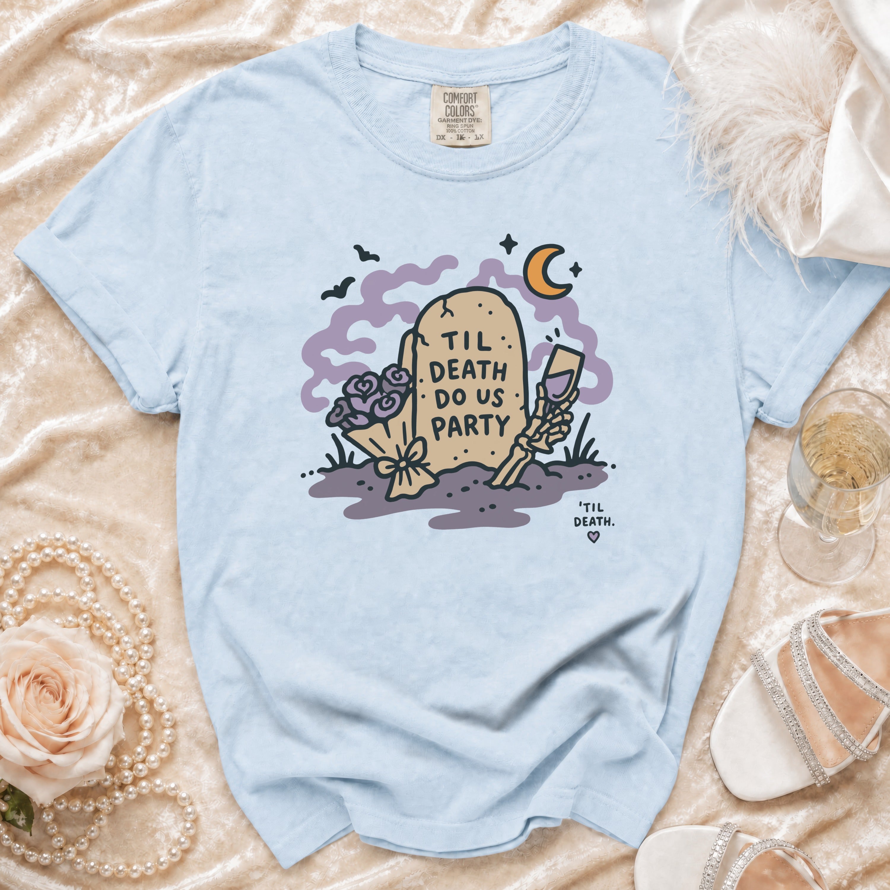 Light blue t-shirt with "Til Death Do Us Party" tombstone graphic.