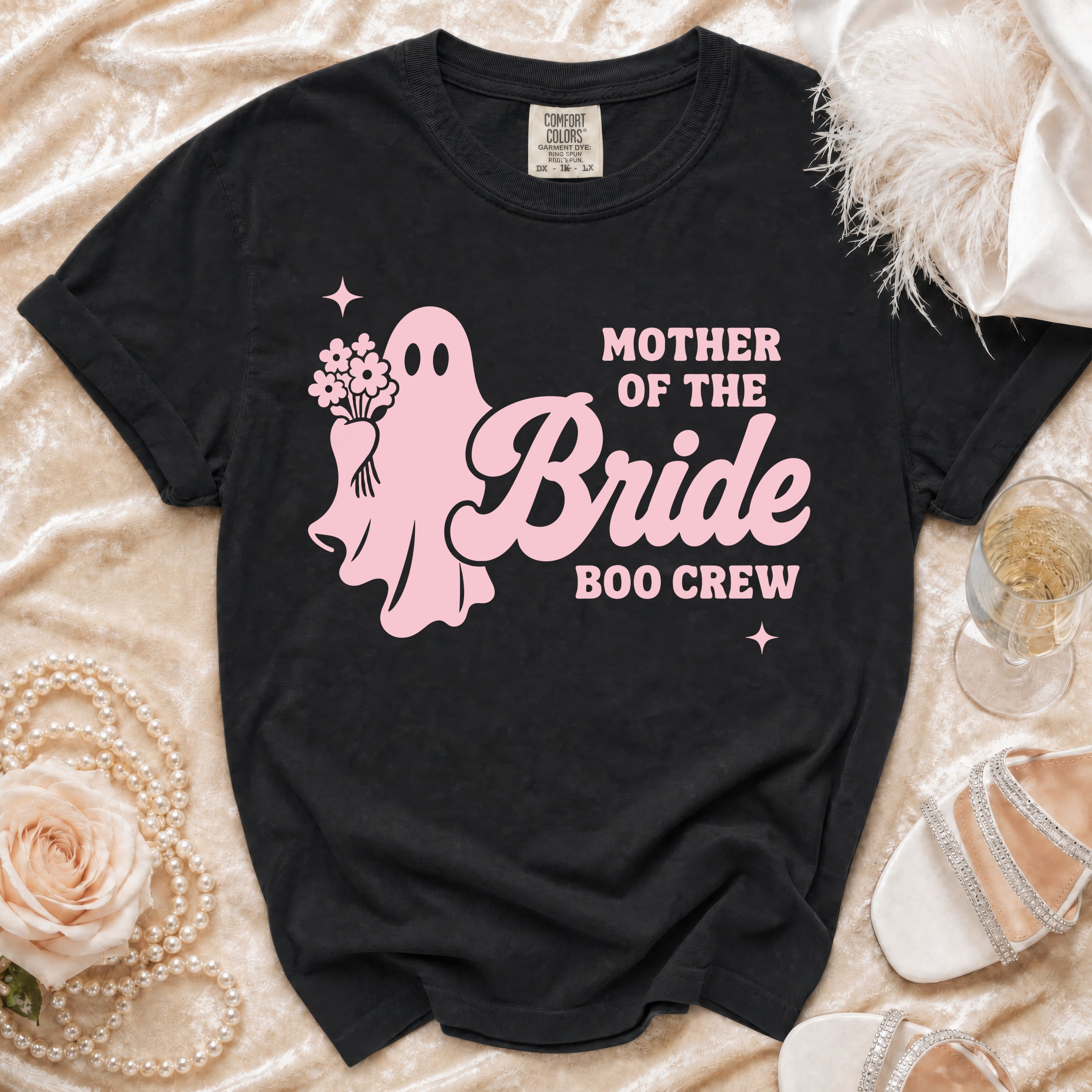 Black t-shirt with pink ghost graphic and "Mother of the Bride Boo Crew" text.