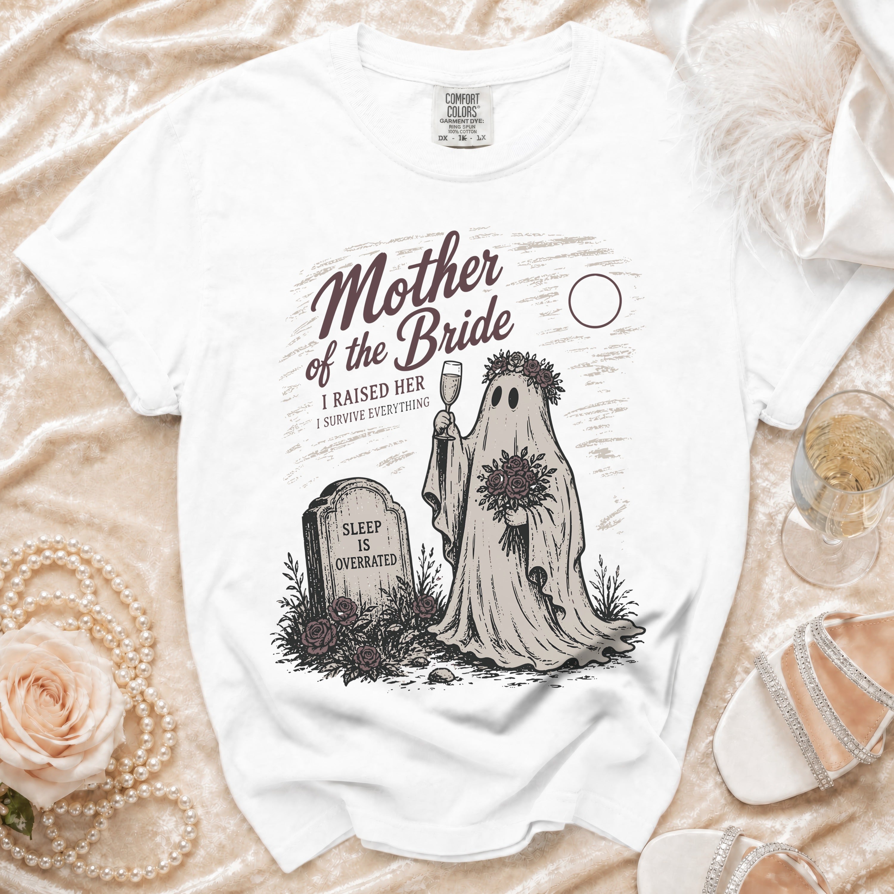 White t-shirt with "Mother of the Bride" text and a ghost holding flowers.