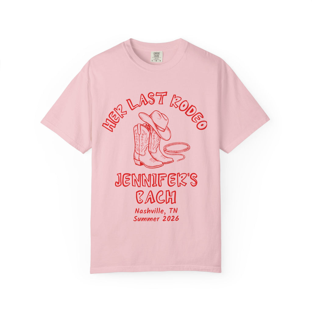 Pink t-shirt with "Her Last Rodeo" and cowboy boot graphic.