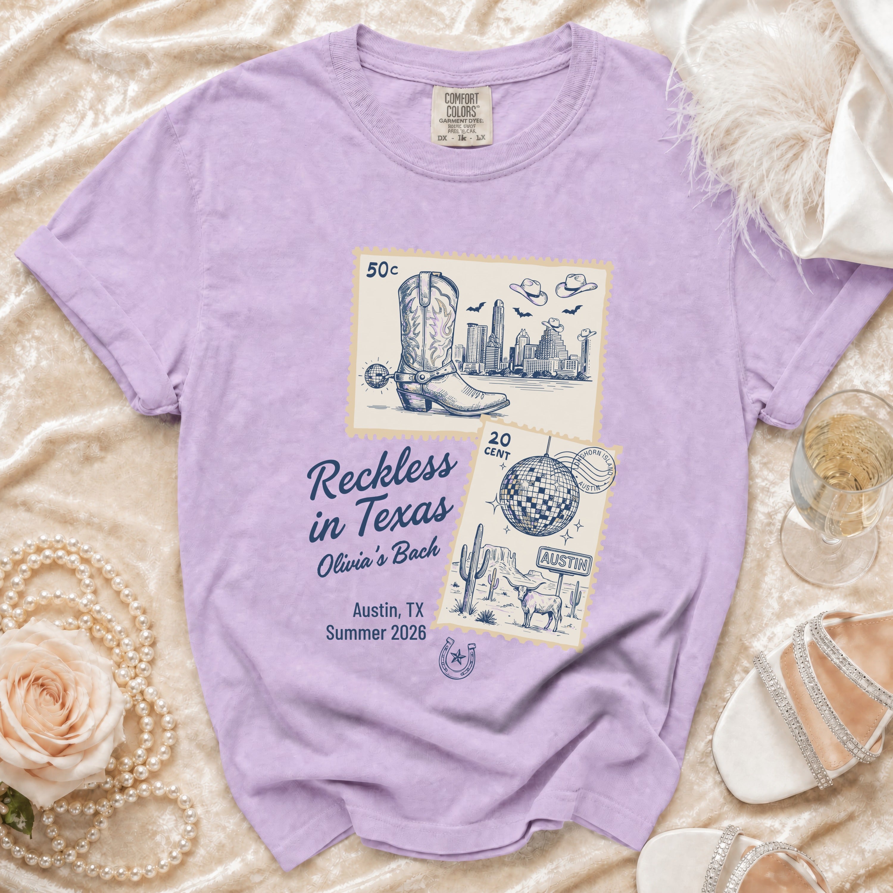 Purple t-shirt with "Reckless in Texas Olivia's Bach Austin, TX Summer 2026" text and stamps.