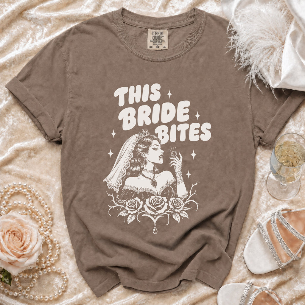 Brown t-shirt with "This Bride Bites" text and a vampire bride graphic.