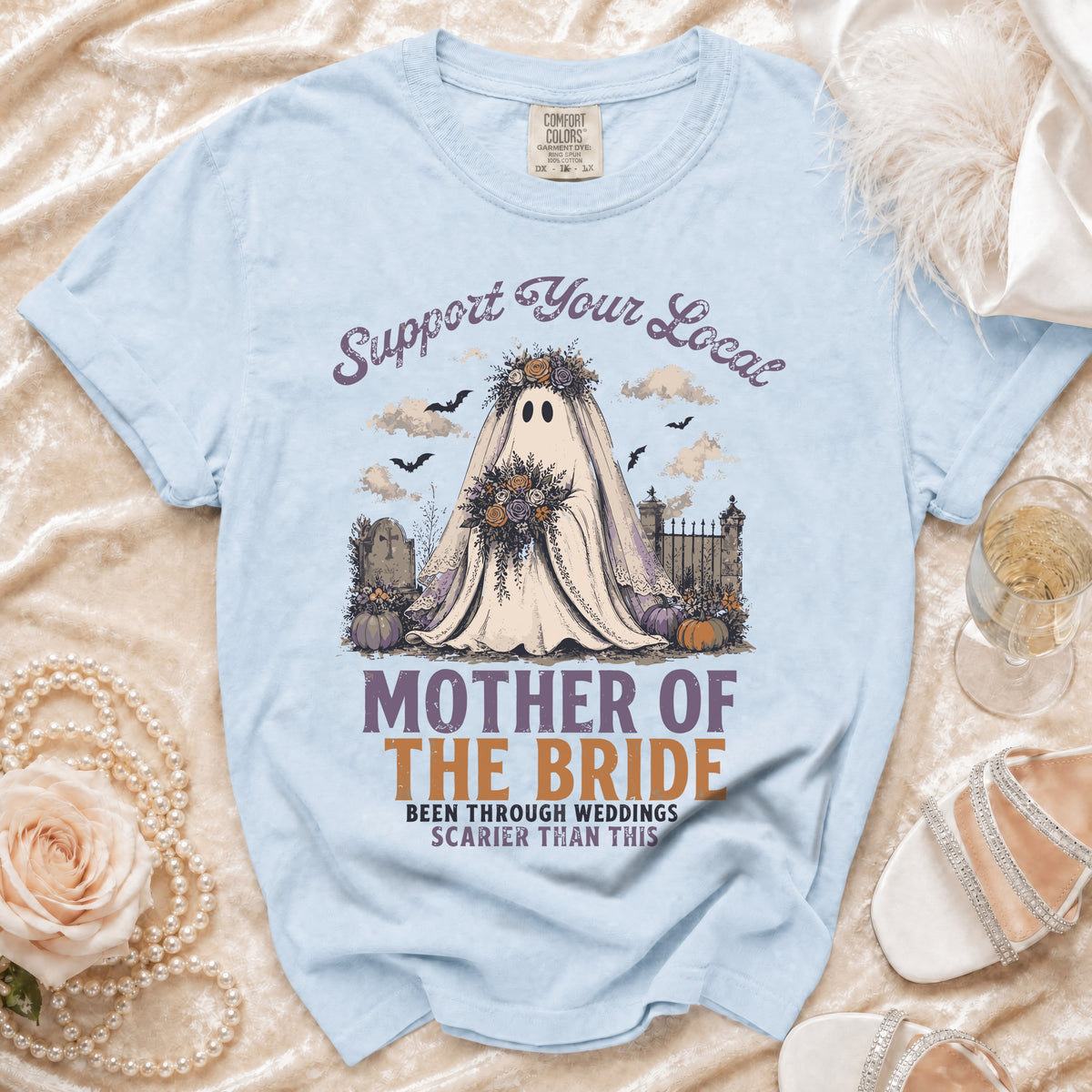 Light blue t-shirt graphic: "Support Your Local Mother of the Bride" with ghost.