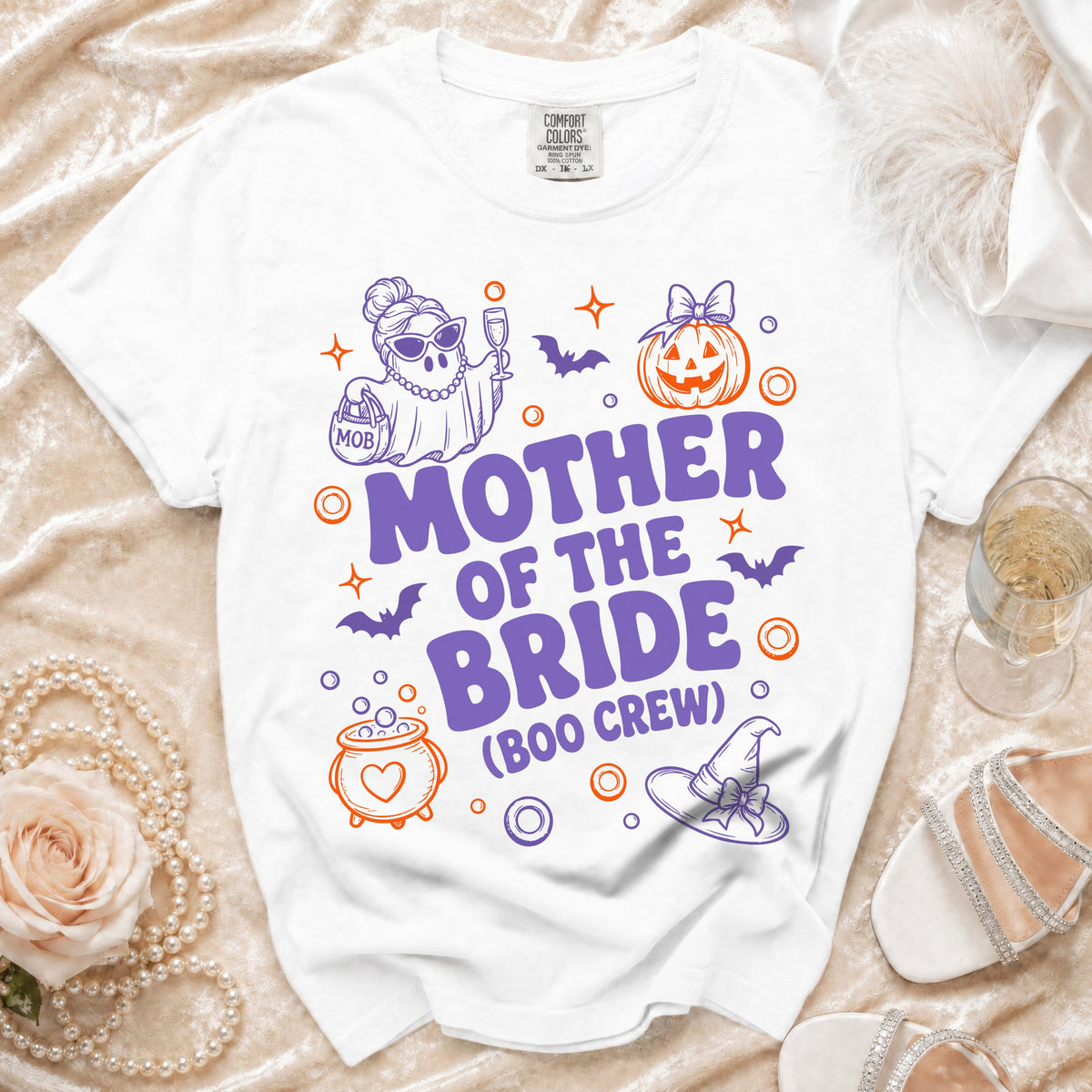 White t-shirt with "Mother of the Bride (Boo Crew)" Halloween-themed graphic.