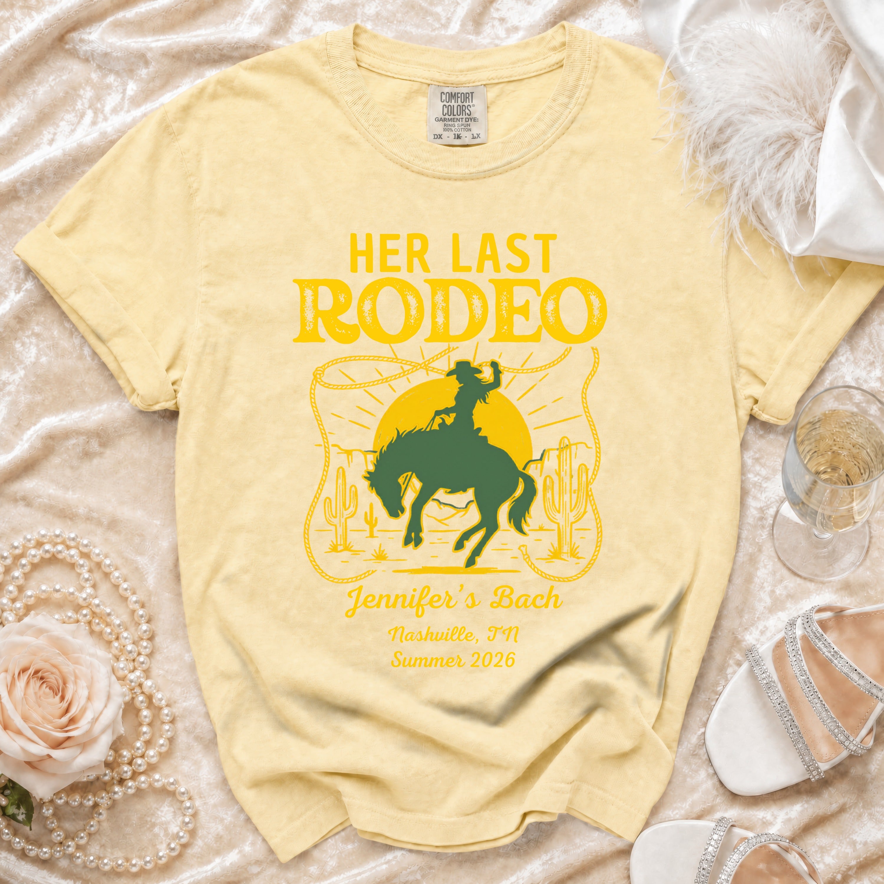 Yellow t-shirt with "Her Last Rodeo" graphic for Jennifer's Bach Nashville 2026.