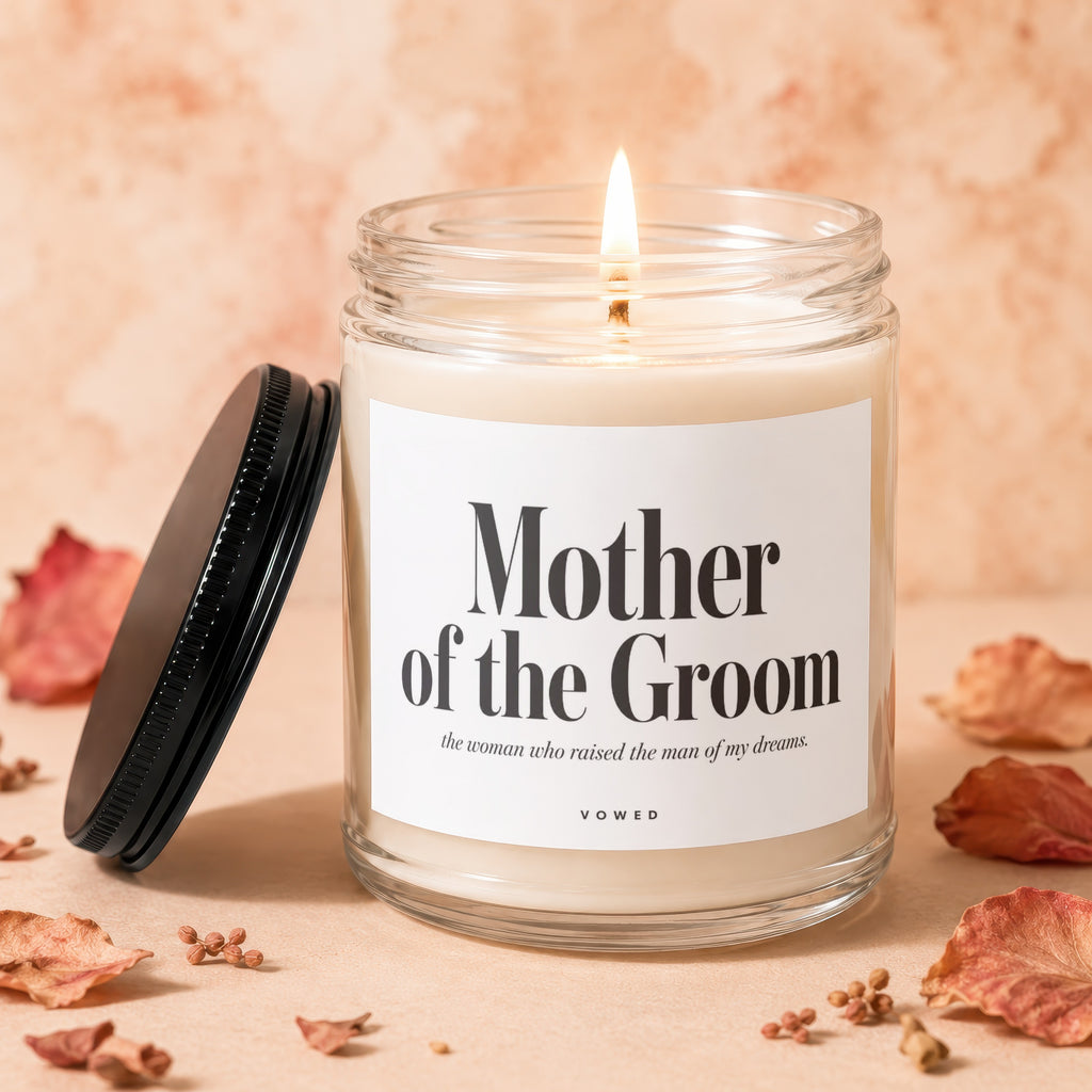 Mother of the Groom candle with VOWED inscription and decorative elements.