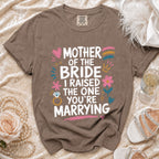 Brown Comfort Colors t-shirt with "Mother of the Bride, I Raised the One You're Marrying" text.