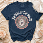 Navy t-shirt with "Mother of the Bride Raising a Princess Surviving Halloween Season" graphic.