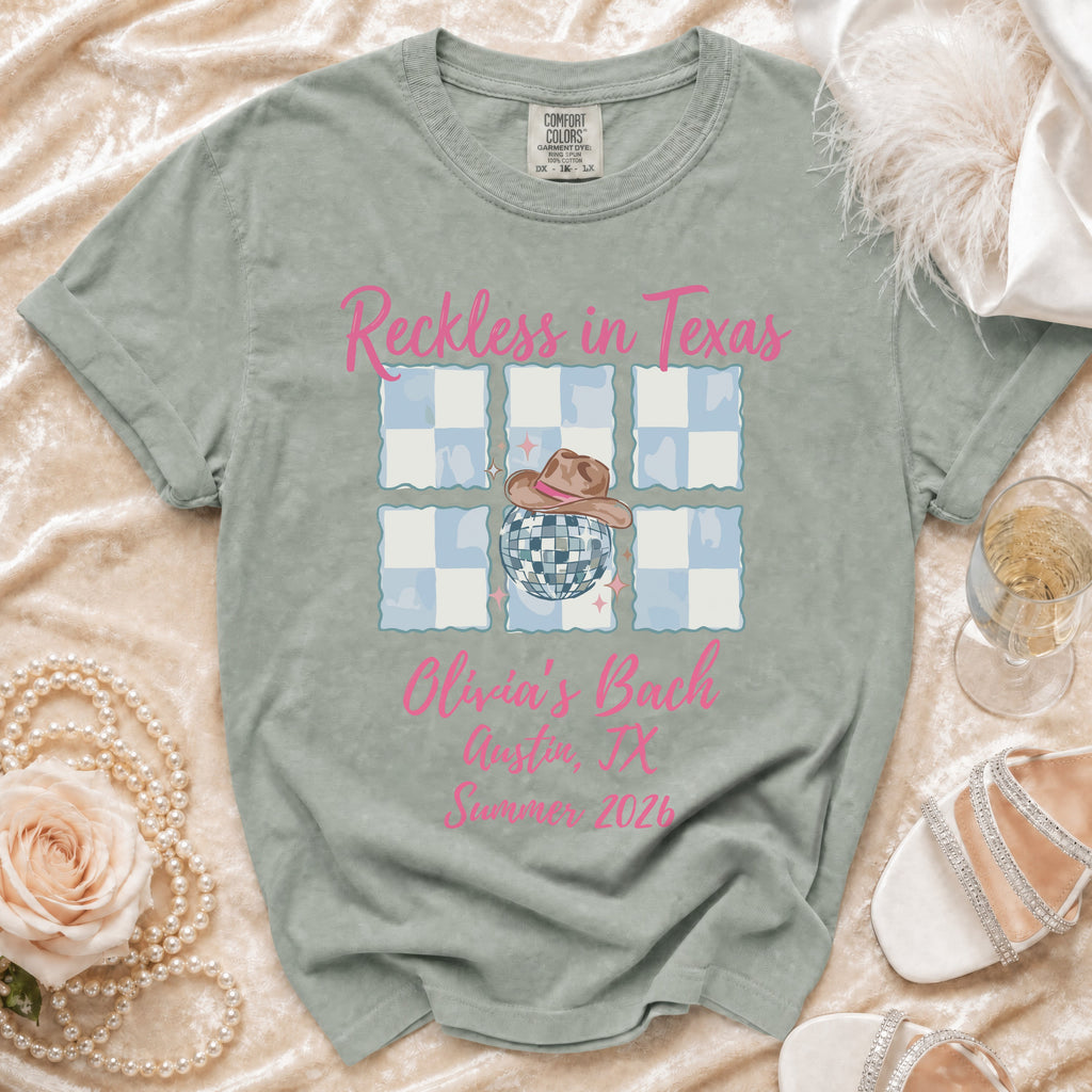 T-shirt with "Reckless in Texas Olivia's Bach" and Austin, TX Summer 2026.