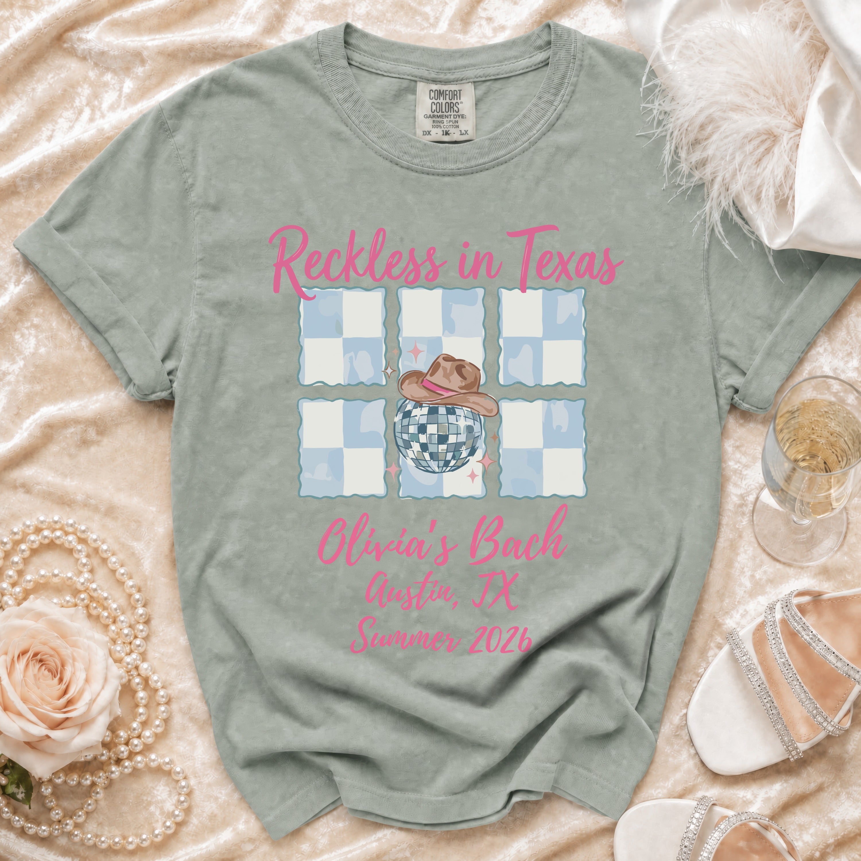 T-shirt with "Reckless in Texas Olivia's Bach" and Austin, TX Summer 2026.