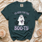 Dark teal t-shirt with ghost graphic saying "I'm here for the boo-ty".