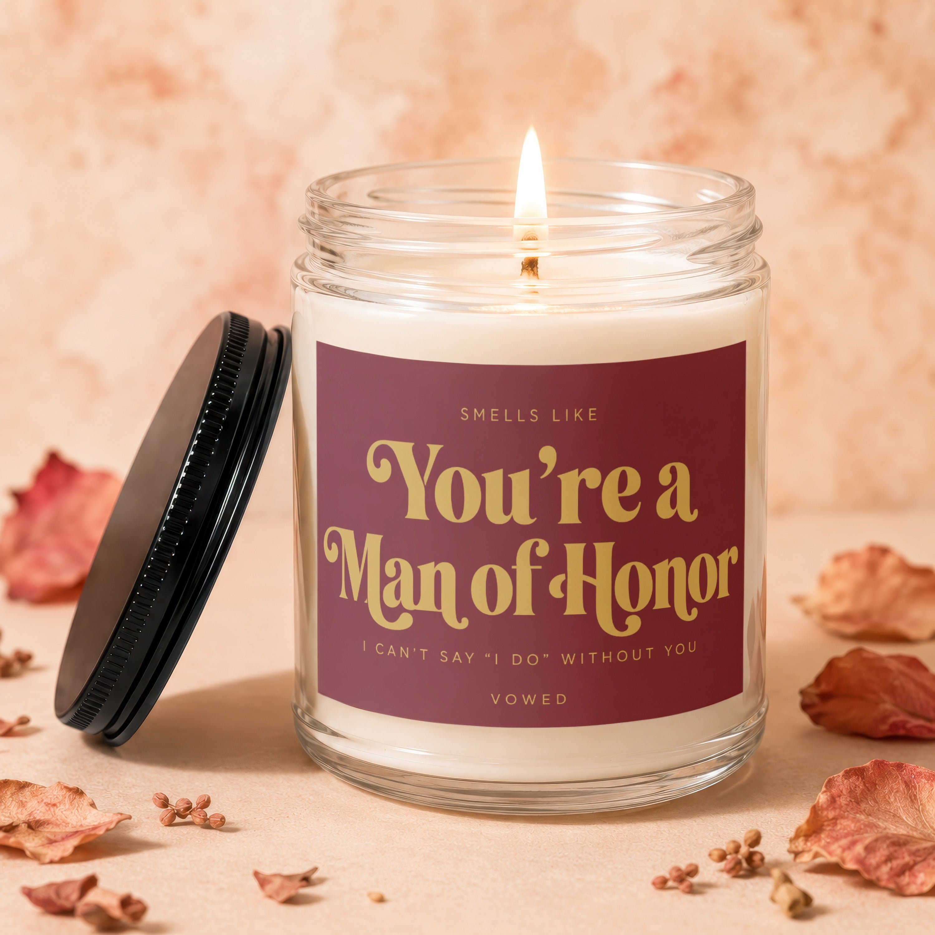 Candle with "You're a Man of Honor" text and a lit wick.