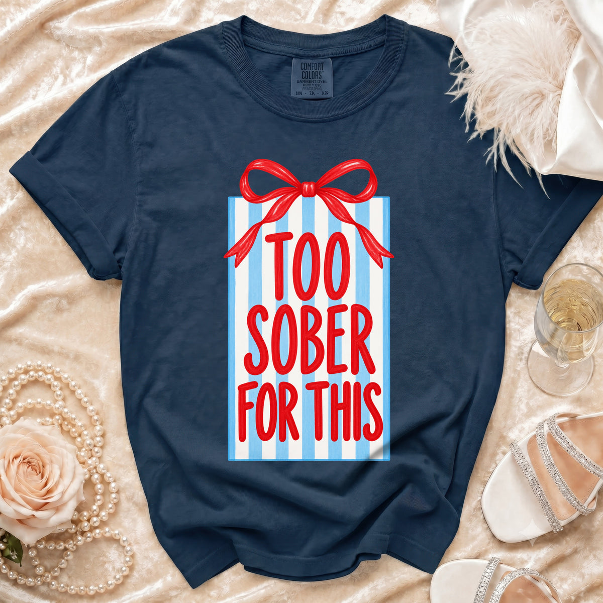 Navy t-shirt with gift box graphic and text "TOO SOBER FOR THIS".