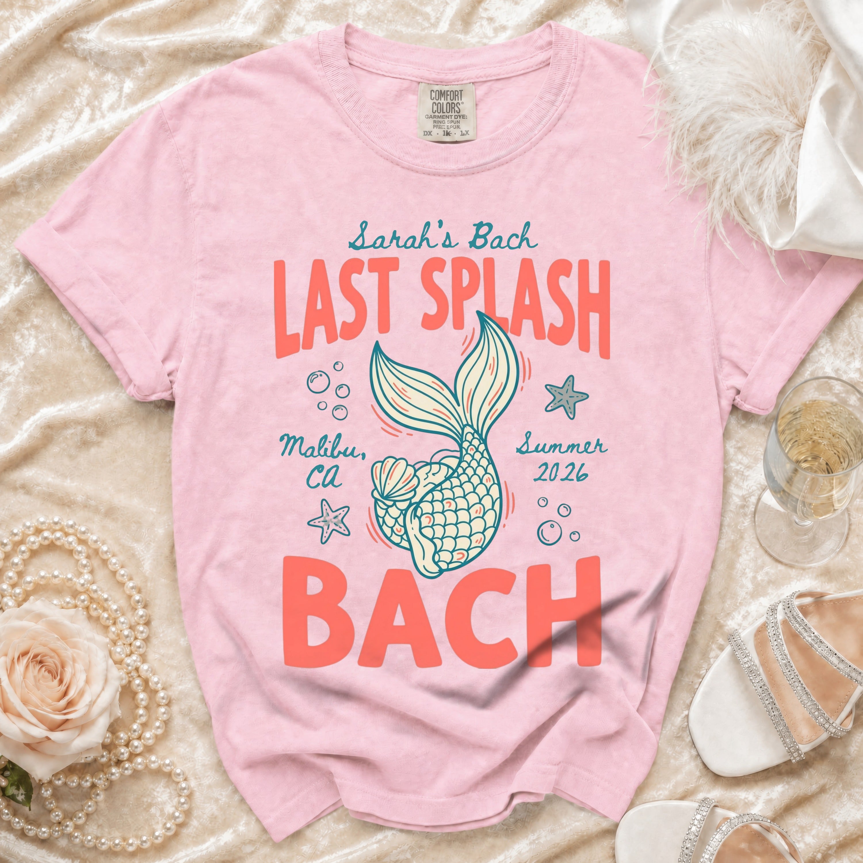Pink t-shirt with "Sarah's Bach LAST SPLASH Malibu, CA Summer 2026 BACH" and a mermaid tail.