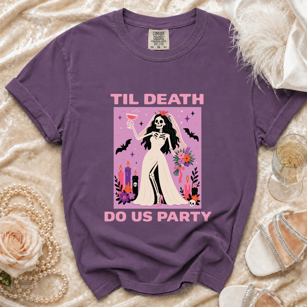 Purple t-shirt with skeleton bride graphic that reads "Til Death Do Us Party".