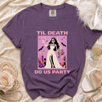 Purple t-shirt with skeleton bride graphic that reads "Til Death Do Us Party".