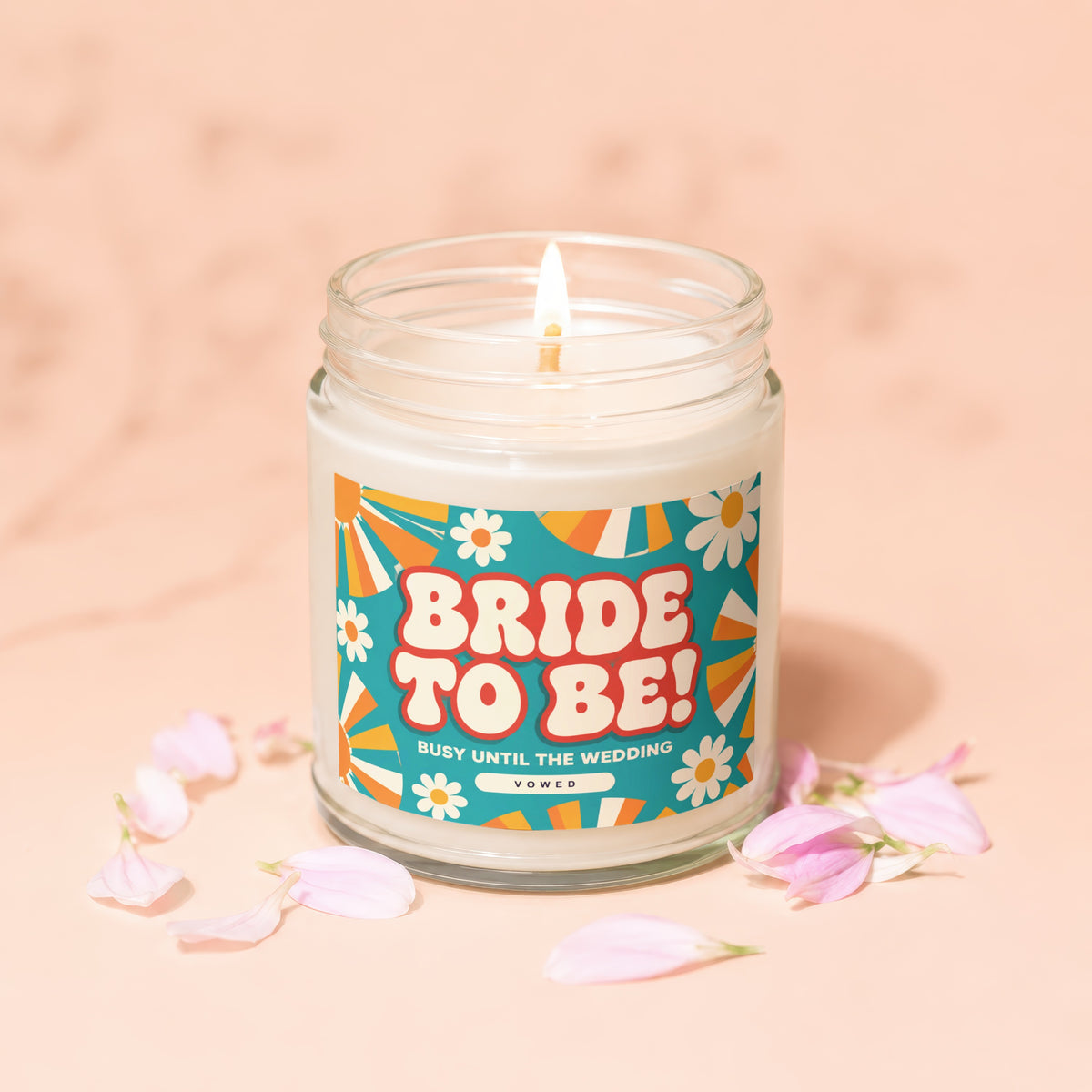 "Bride to Be!" candle with "Busy Until the Wedding" text, surrounded by petals.
