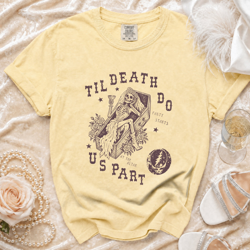 Yellow t-shirt with skeleton bride in coffin graphic and text "Til Death Do Us Part".