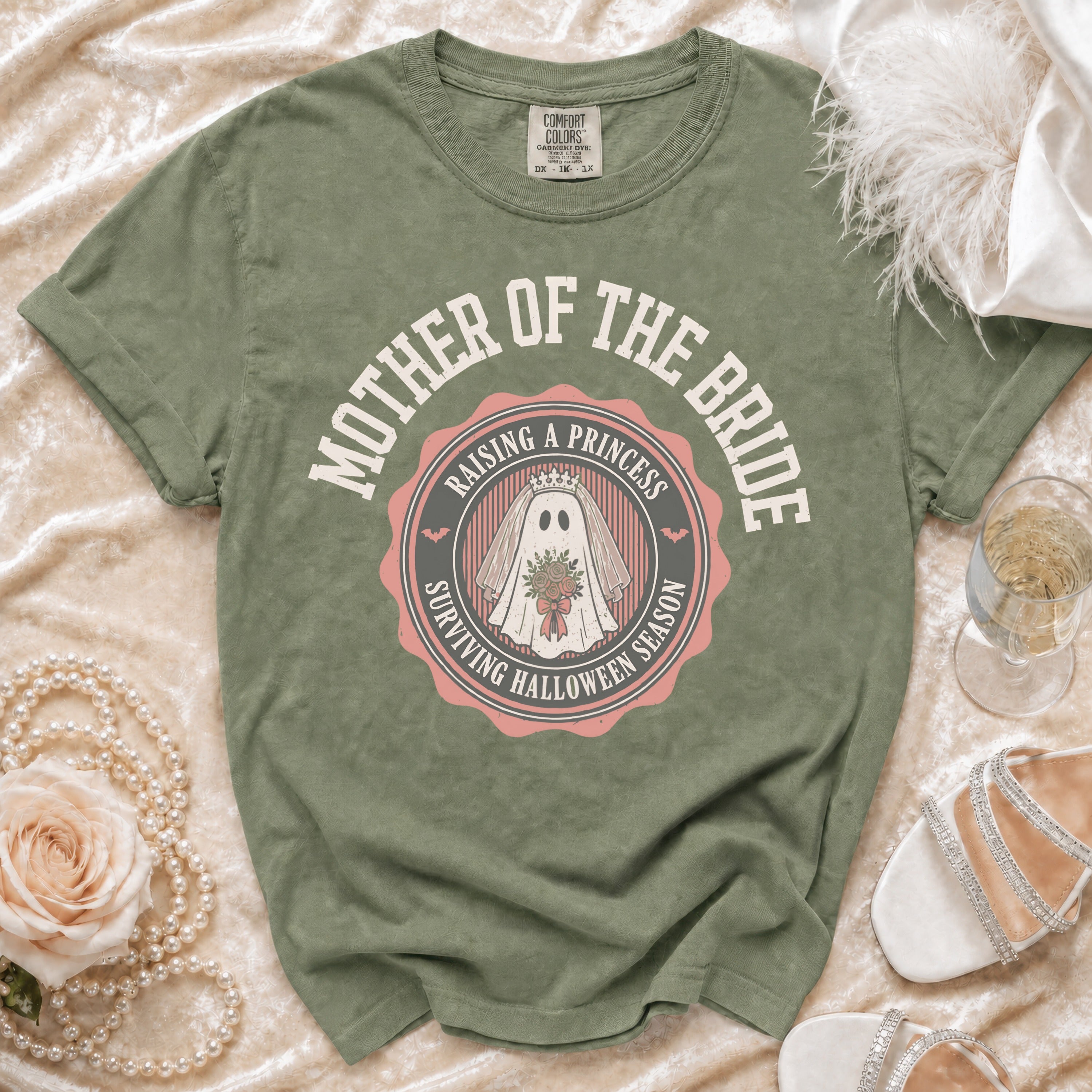 Green t-shirt with "Mother of the Bride" and a ghost bride graphic.