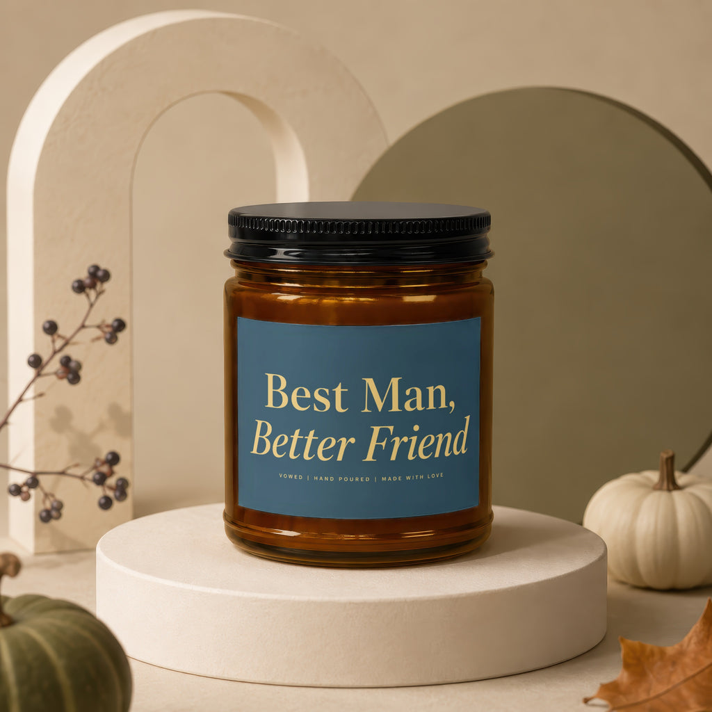 Amber candle with "Best Man, Better Friend" text on a dark blue label.