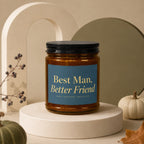 Amber candle with "Best Man, Better Friend" text on a dark blue label.