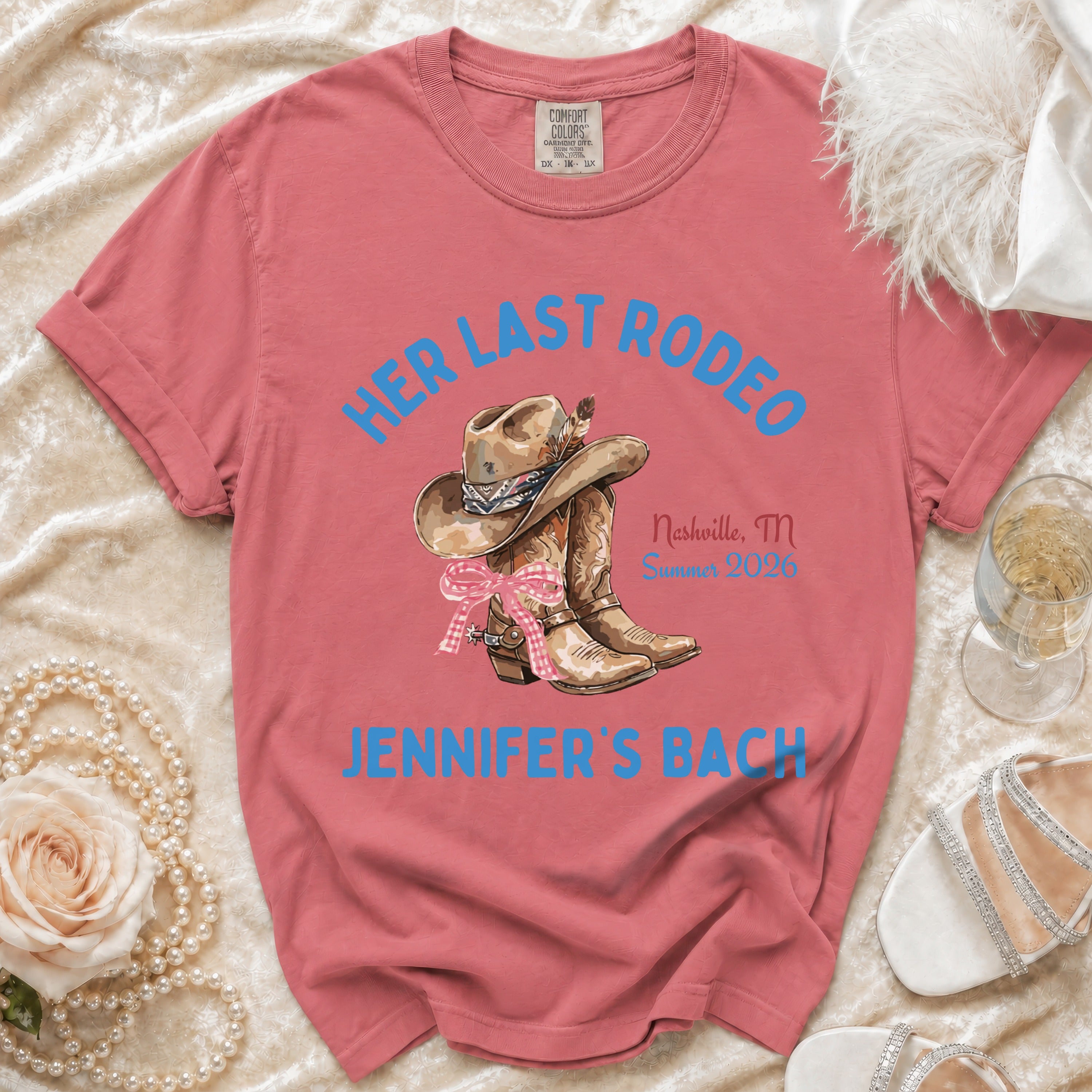 Pink t-shirt with "Her Last Rodeo Nashville, TN Summer 2026 Jennifer's Bach" text and cowboy boots.