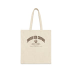 A cream-colored canvas tote bag featuring brown arched text reading FOUND HER COWBOY, a horseshoe, and SCOTTSDALE, 2027.