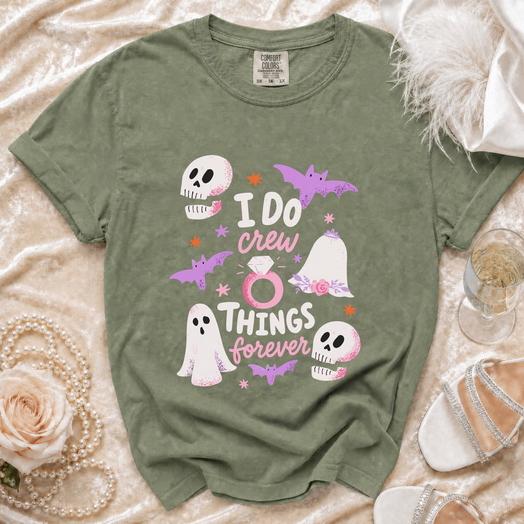 Green t-shirt with "I DO crew THINGS forever" text and Halloween-themed graphics.