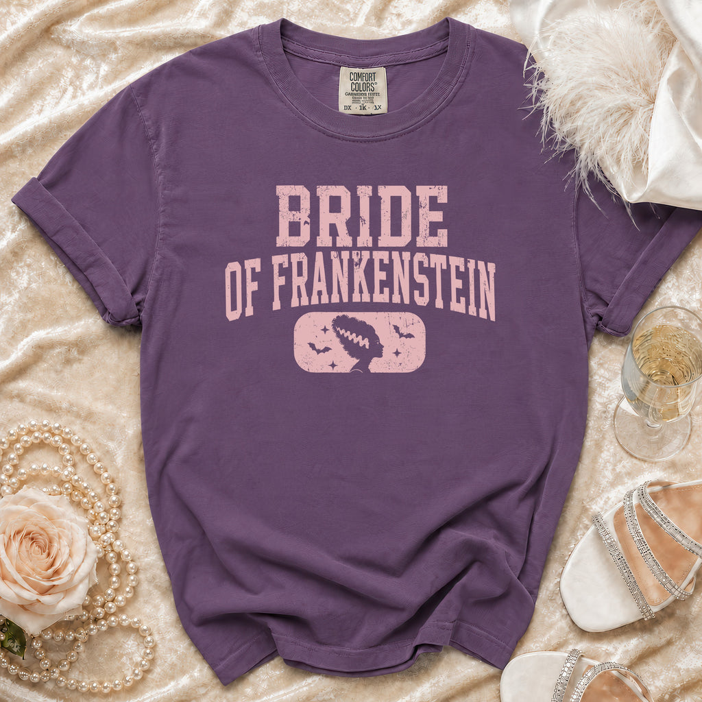 Purple t-shirt with "Bride of Frankenstein" text and character graphic.