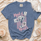 Blue t-shirt with "Maid of Honor" text, martini glass, and stamps.
